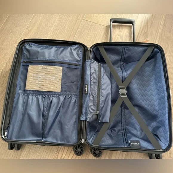 New! CALPAK 22” Hardside Carry-on Spinner With Front Pocket